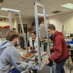 Members of Red Thunder Robotics working on a project.